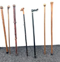 Selection of vintage walking sticks, various handle designs (7 sticks in total)