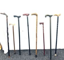 Selection of vintage walking sticks, various handle designs (8 sticks in total)