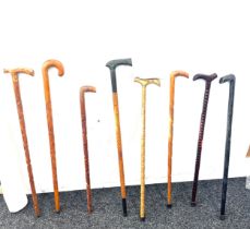 Selection of vintage carved walking sticks (8 sticks in total)