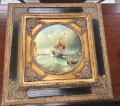 Gilt framed oil on boards depicting gallions measures approximately 19inches square