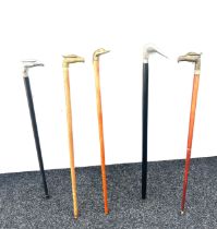 Selection of vintage wooden walking sticks with brass ducks / birds , (5 in total)