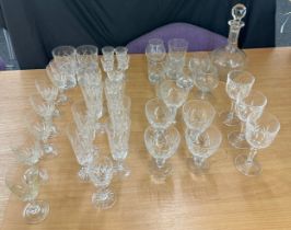 Large selection of assorted glassware includes decanter etc