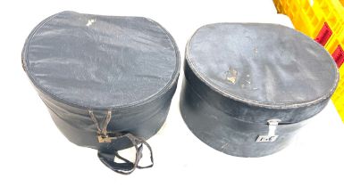 2x vintage leather hat boxes containing an assortment of tweed etc textiles (2 hat boxes)