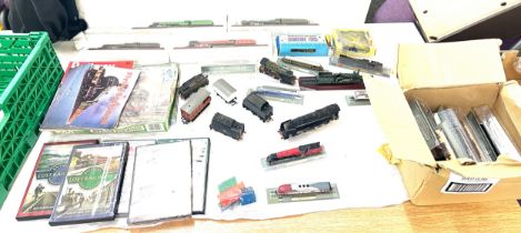 Large selection of train and railway accessories to include engines, DVDS, model railways etc