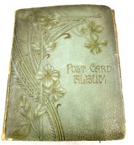 Vintage Postcard album containing a large selection of vintage postcards