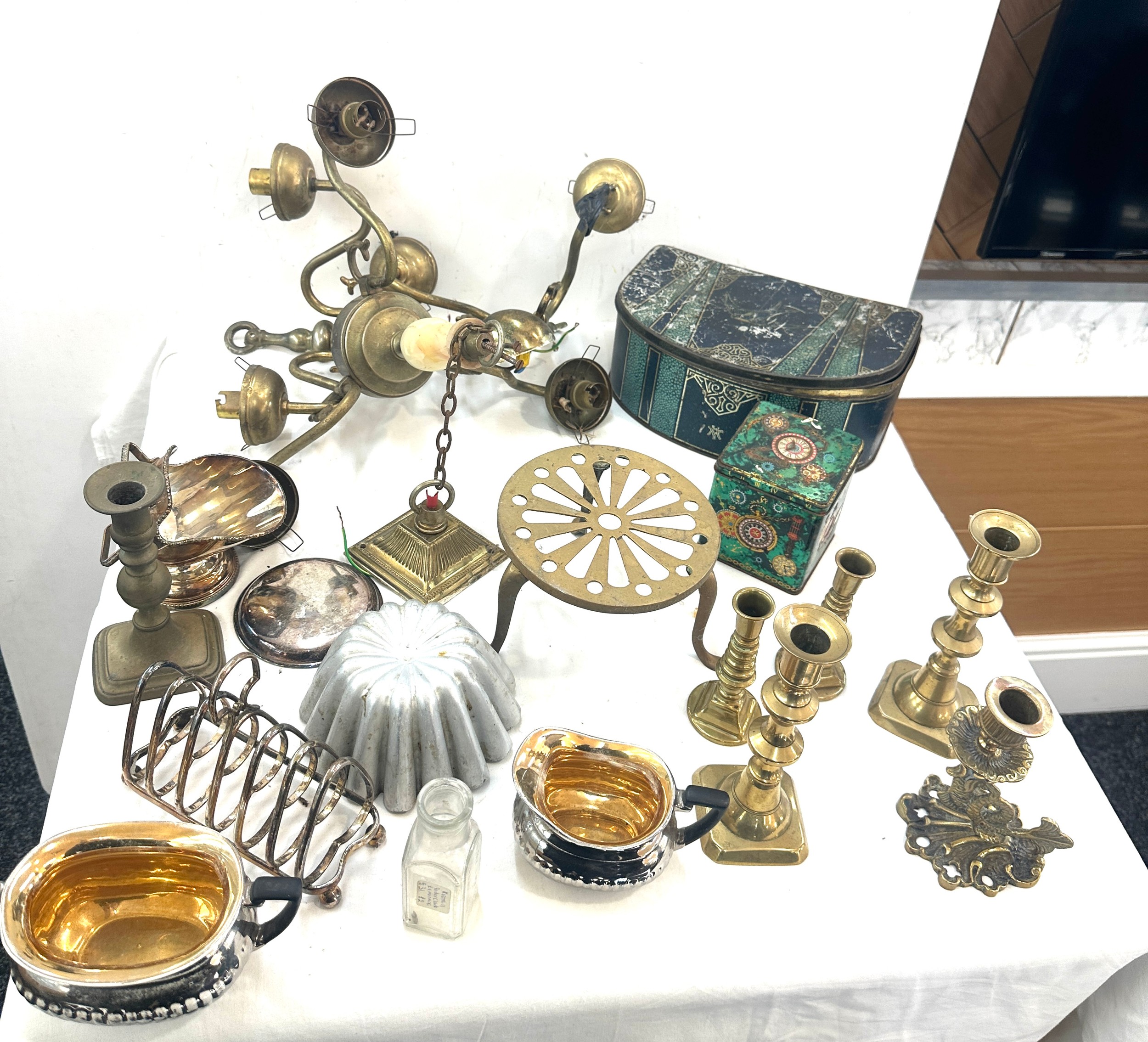 Selection of collectables to include brass candle sticks, brass ceiling light, glass bottles ,EPNS