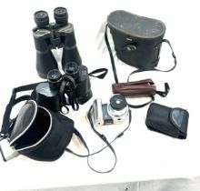 Selection of binoculars includes Prinz 10x50, Traveler zoom, piccolo 10x25 etc