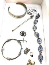 Tray of collectables includes silver bangle, silver cocktail stirer etc