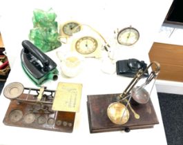 2 sets brass scales 1 postal scales, 1 balance scales and 3 bakelite clocks etc