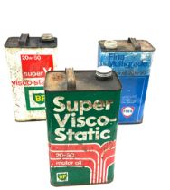 Three vintage oil cans includes fina multigrade, BP etc