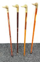 Selection of vintage wooden walking sticks with brass duck head handles (4 in total)