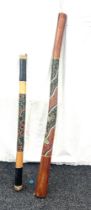 Australian Didgeridoo measures 51 inches, rain stick measures 40 inches