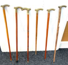 Selection of vintage wooden walking sticks with brass handles (6 in total)