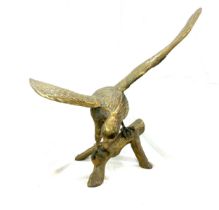 Large brass eagle on branch, overall measurements: Height 20 inches, Width 22 inches