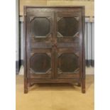 A stained pine food cupboard,