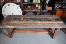 A pine workbench dining table by Parry & Sons of Shoreditch,