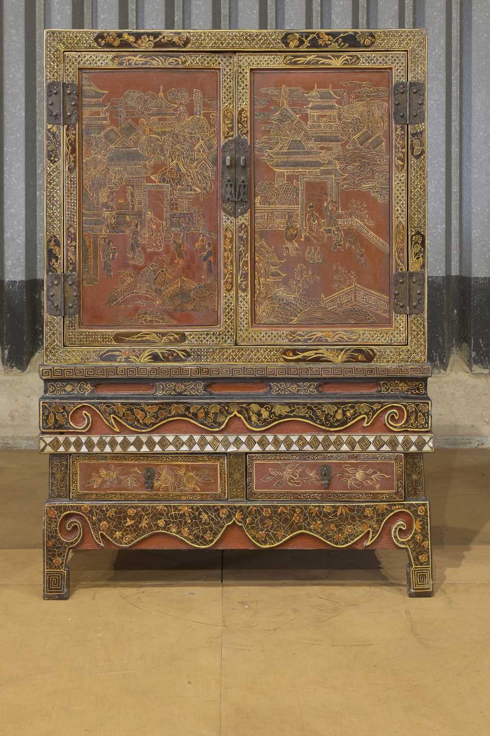 A lacquered, painted and gilt wooden marriage cabinet,