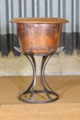 A copper copper wine cooler,