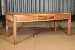 A fruitwood kitchen table,