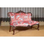 A Louis XV-style mahogany settee,