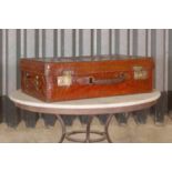 An Edwardian crocodile leather gentleman's vanity case,