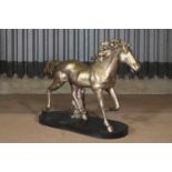 A cast iron figure of a horse,