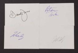 The Monkees: four autographs on white card,