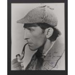 Peter Cushing as Sherlock Holmes,