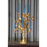 A gilt-metal lily candelabrum,