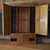 A golden oak haberdasher's cabinet,