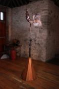 A copper and iron lightning vane,