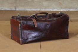 An oxblood leather Gladstone bag,