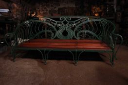 An Art Nouveau painted wrought-iron garden bench,