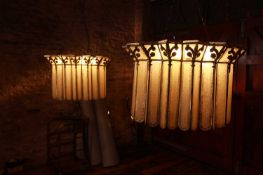 A pair of Art Deco frosted glass and brass cinema lights,