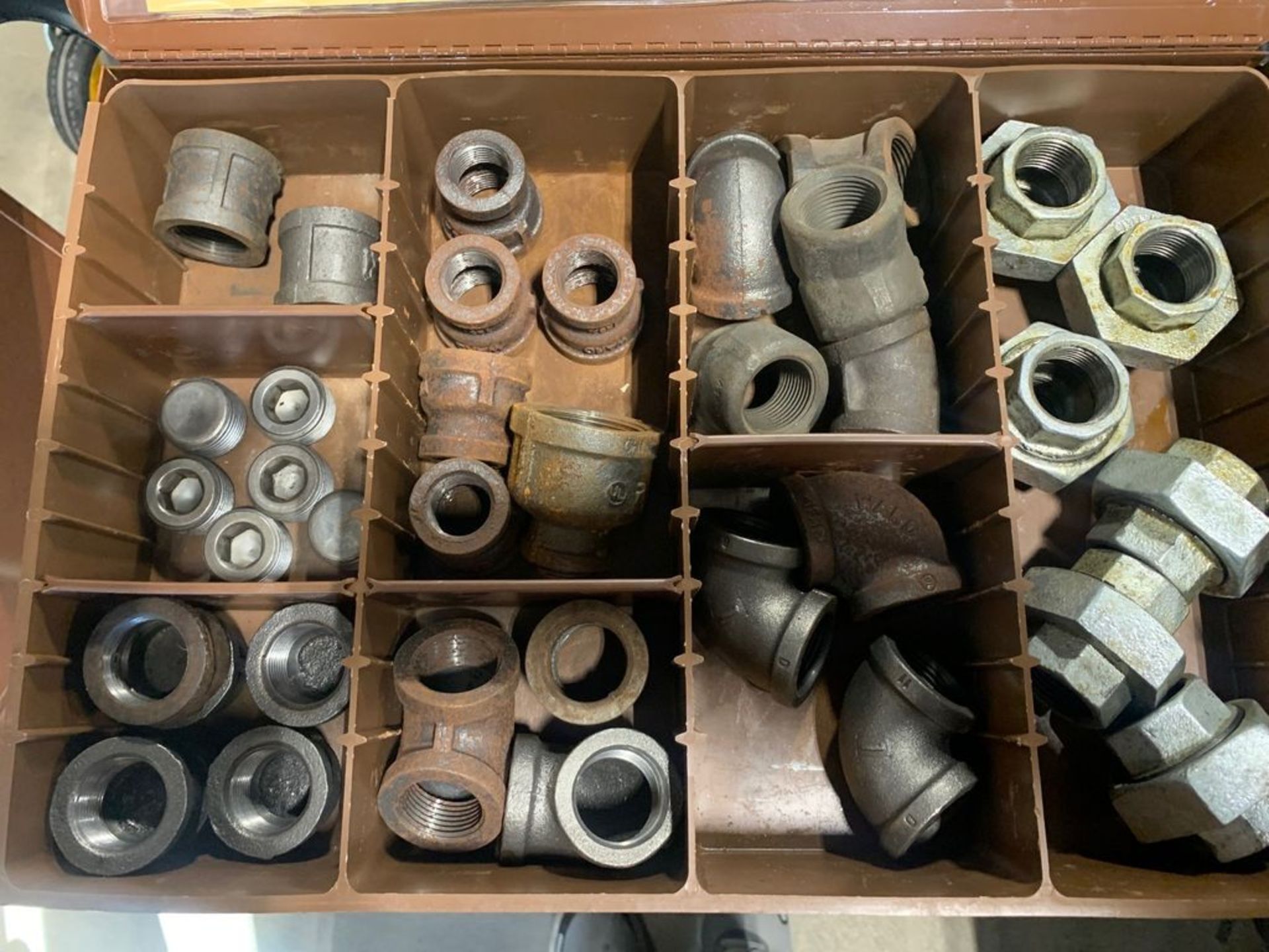 LAWSON PRODUCTS IRON PIPE FITTINGS / ENTIRE CONTENTS OF CASE INCLUDED LOT 17