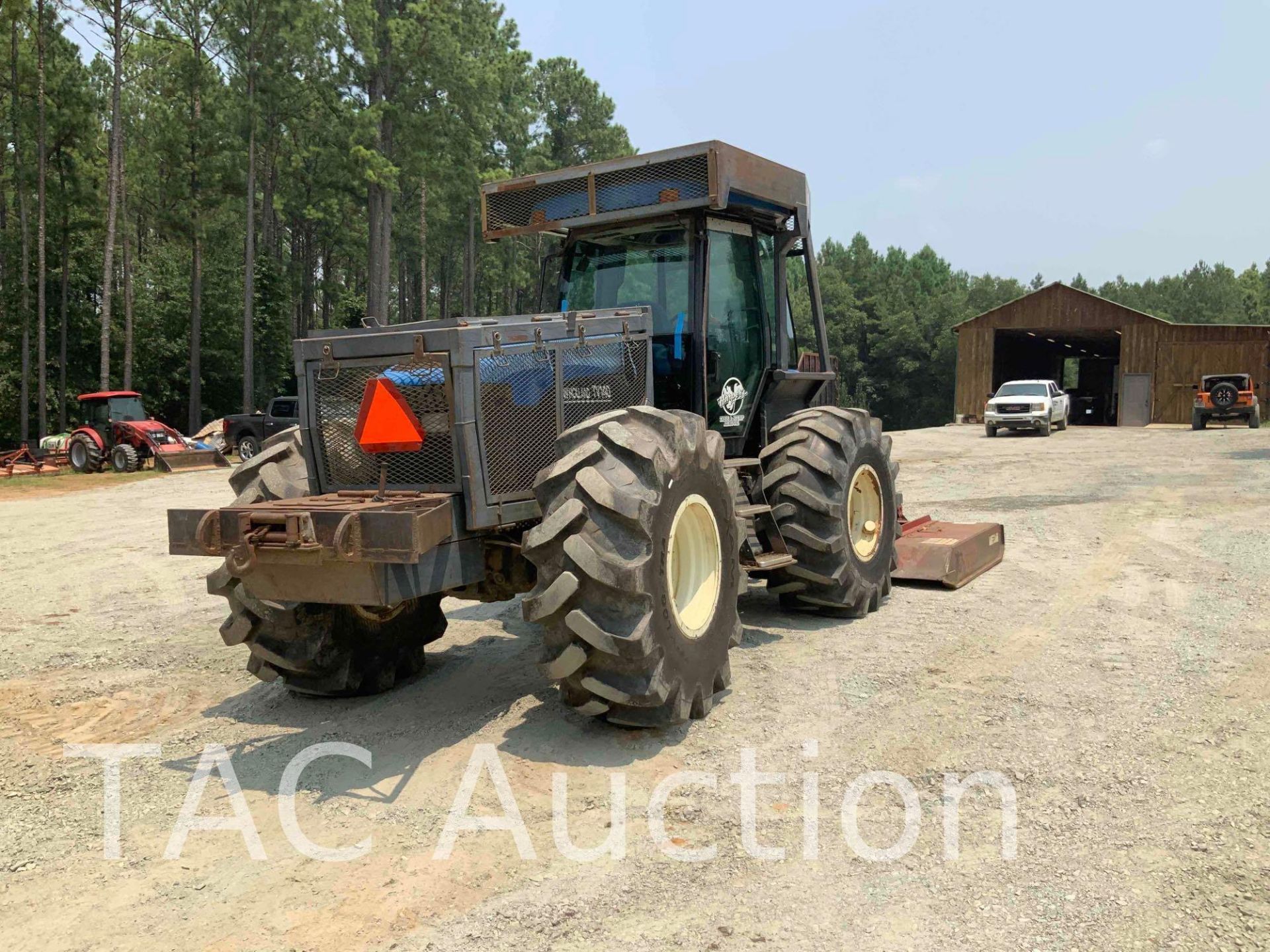 2002 New Holland TV140 4X4 Tractor W/ 10ft Brown Rotary Mower