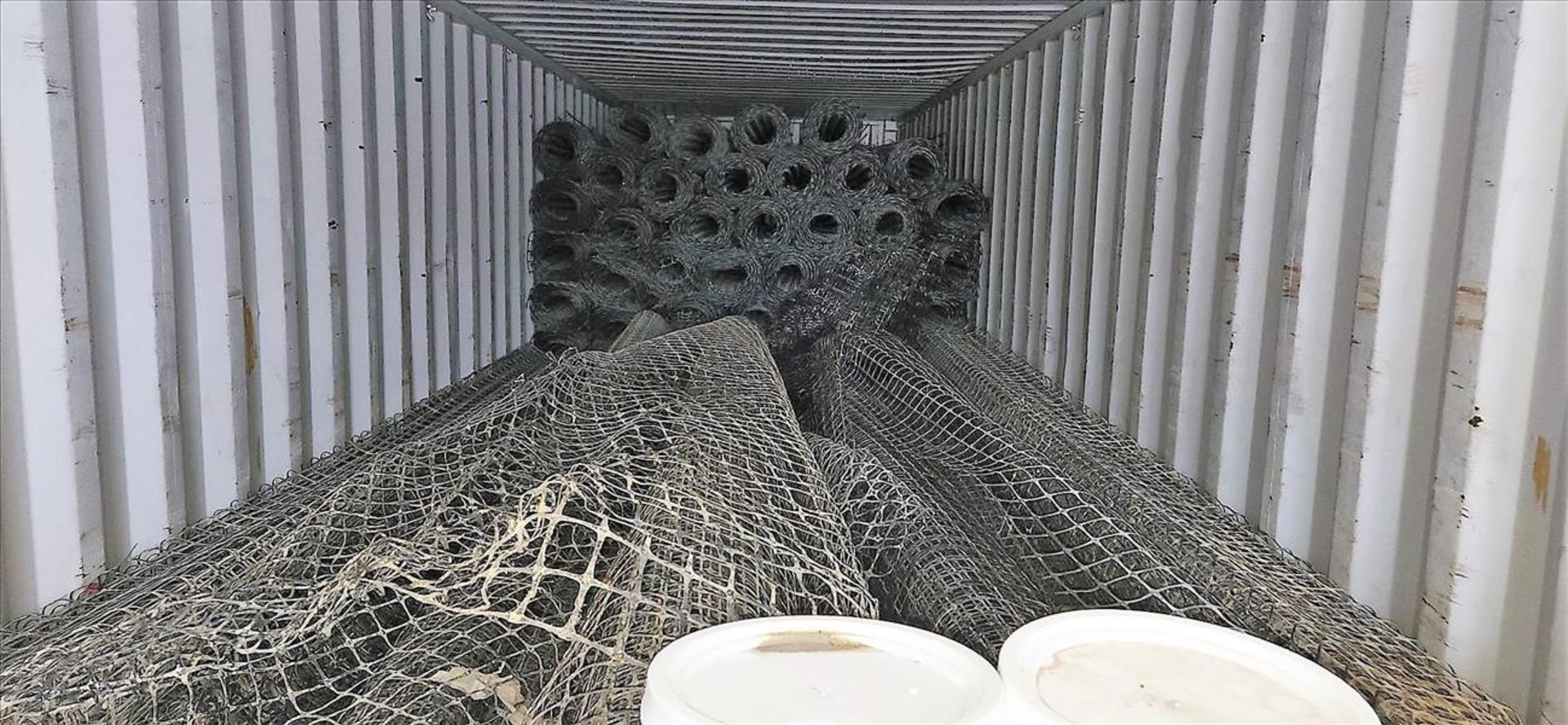 sea container, 40 ft. c/w contents: rolls of plastic mesh, (2 skids) GRH Type GUL Portland limestone