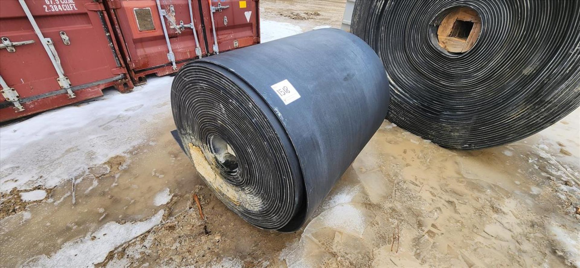 partial roll of conveyor belting, approx. 42 in. x 1/2 in. x 39 in. dia. (Subject to confirmation.