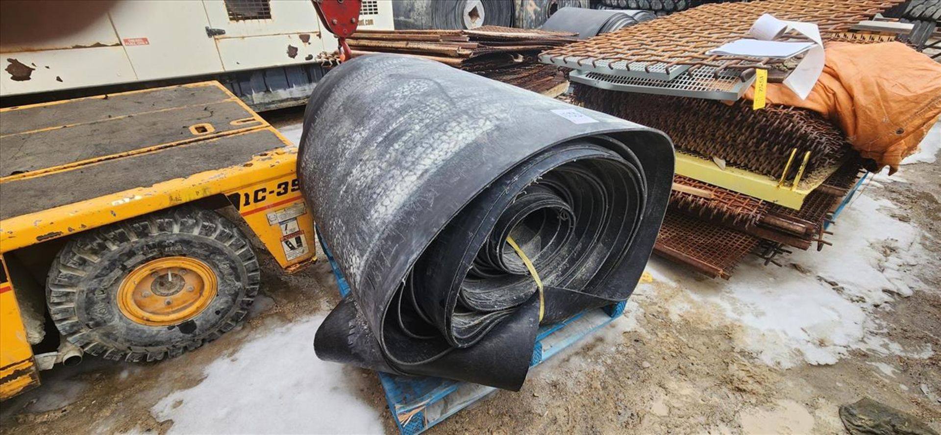 partial roll of conveyor belting, approx. 35 in. x 1/4 in. x 36 in. dia. (Subject to confirmation.