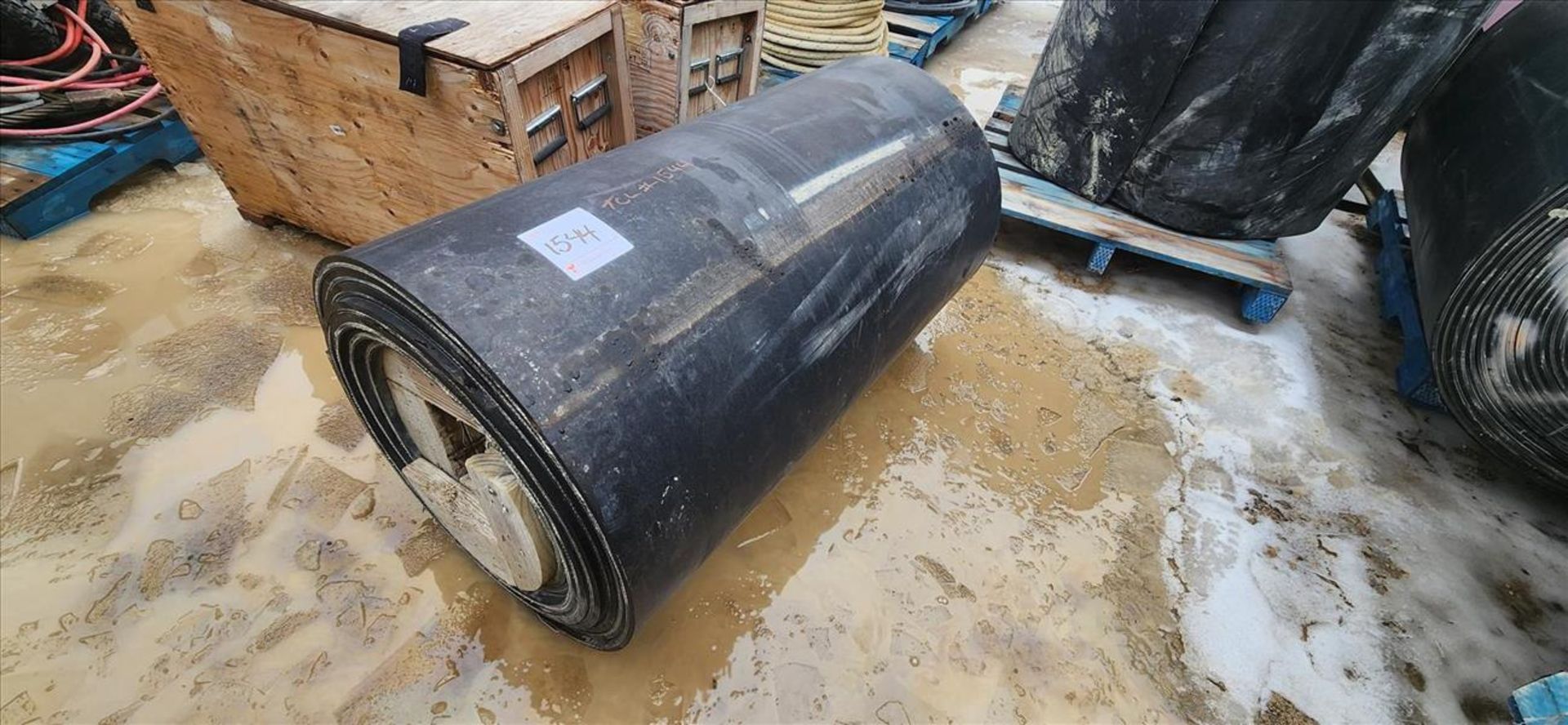 partial roll of conveyor belting, approx. 48 in. x 3/4 in. x 26 in. dia. (Subject to confirmation.