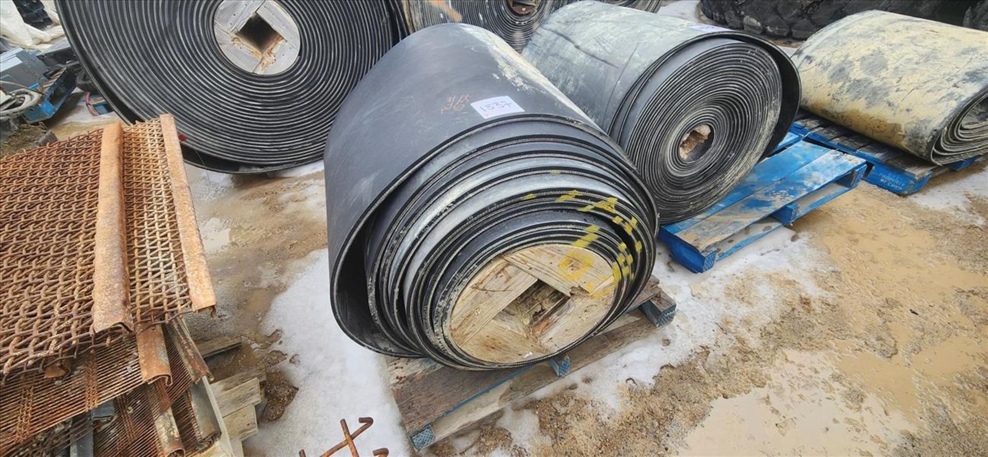 partial roll of conveyor belting, approx. 36 in. x 1/2 in. x 36 in. dia. (Subject to confirmation.