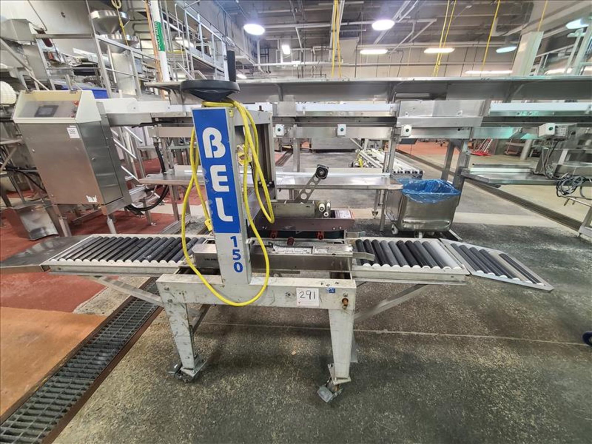 Bel 150 top and bottom case sealer, stainless steel w/ Uni-Drive and casters [Loc. Packaging/