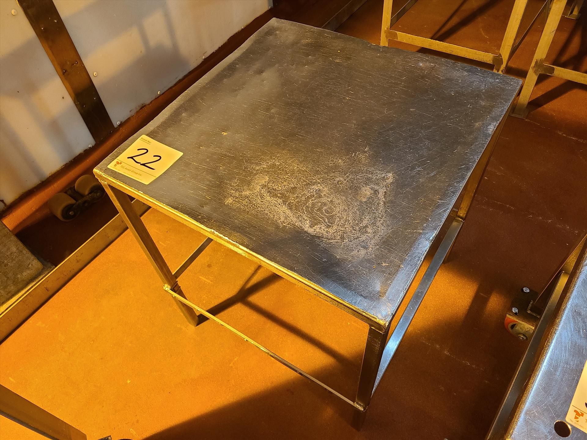 table, stainless steel, approx. 24 in. x 24 in. [Loc. Anti-Cut-Up]