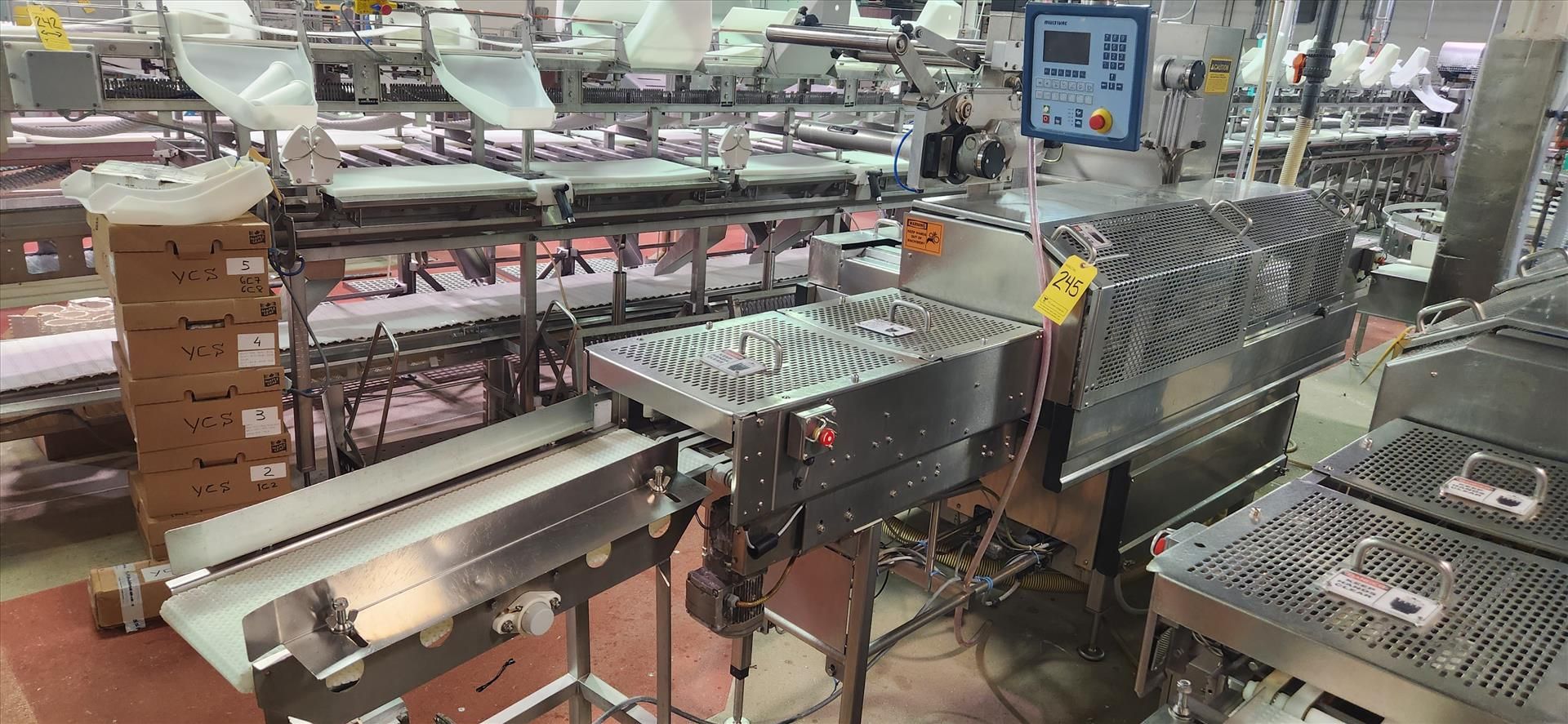 MultiVac tray sealer, mod. T400, stainless steel w/ infeed conveyor [Loc. Deboning]