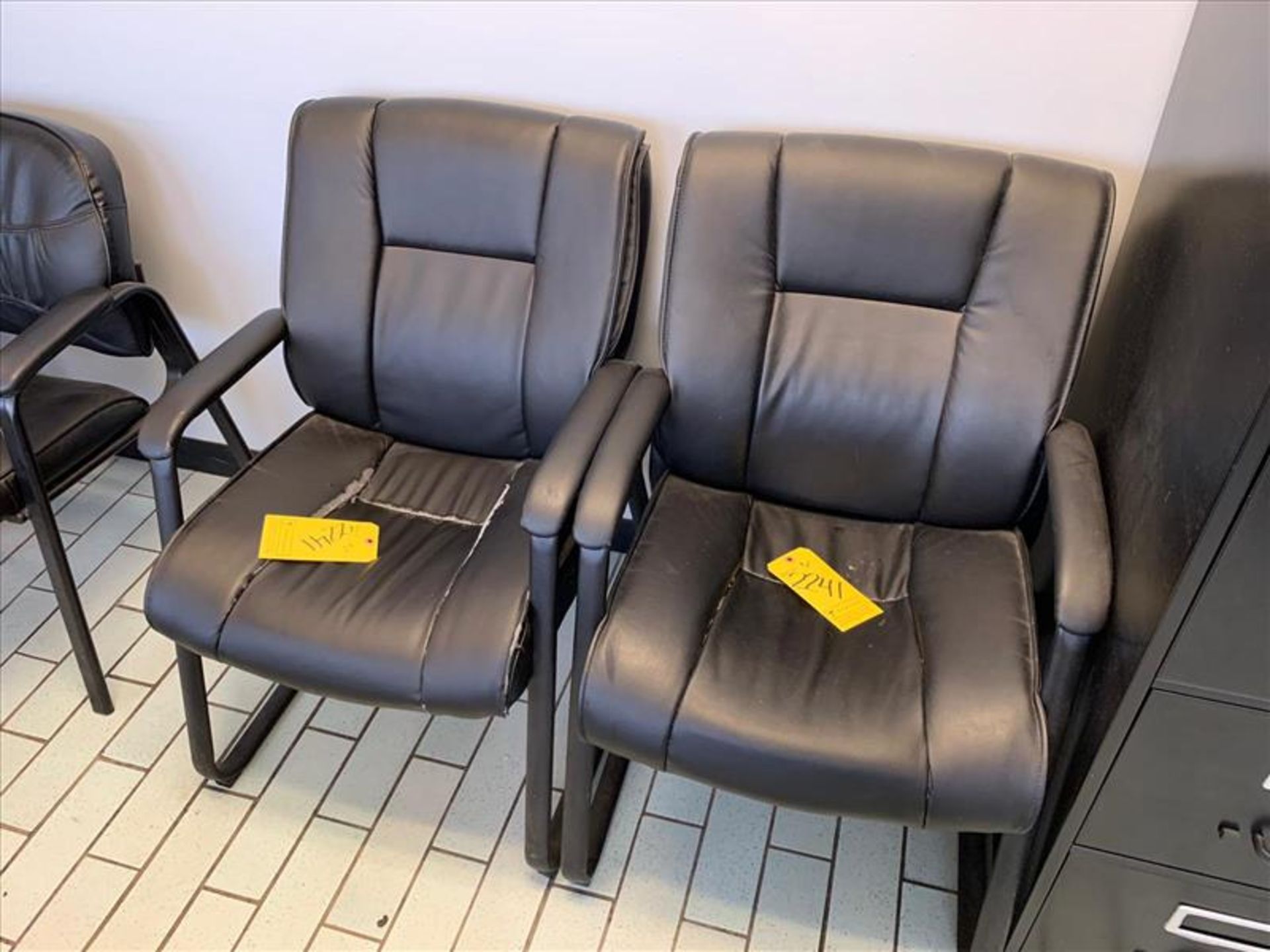 (2) Black leather office chairs with arm rests (HR Manager's Office -Kimberly) [100 Ethel Avenue]