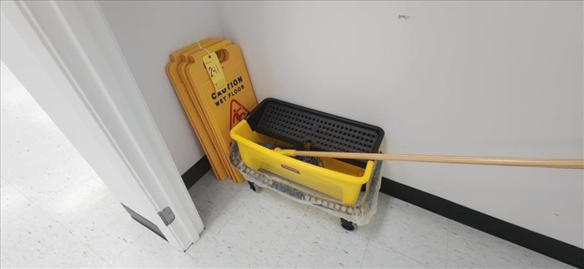 Mop Bucket and Caution Signs