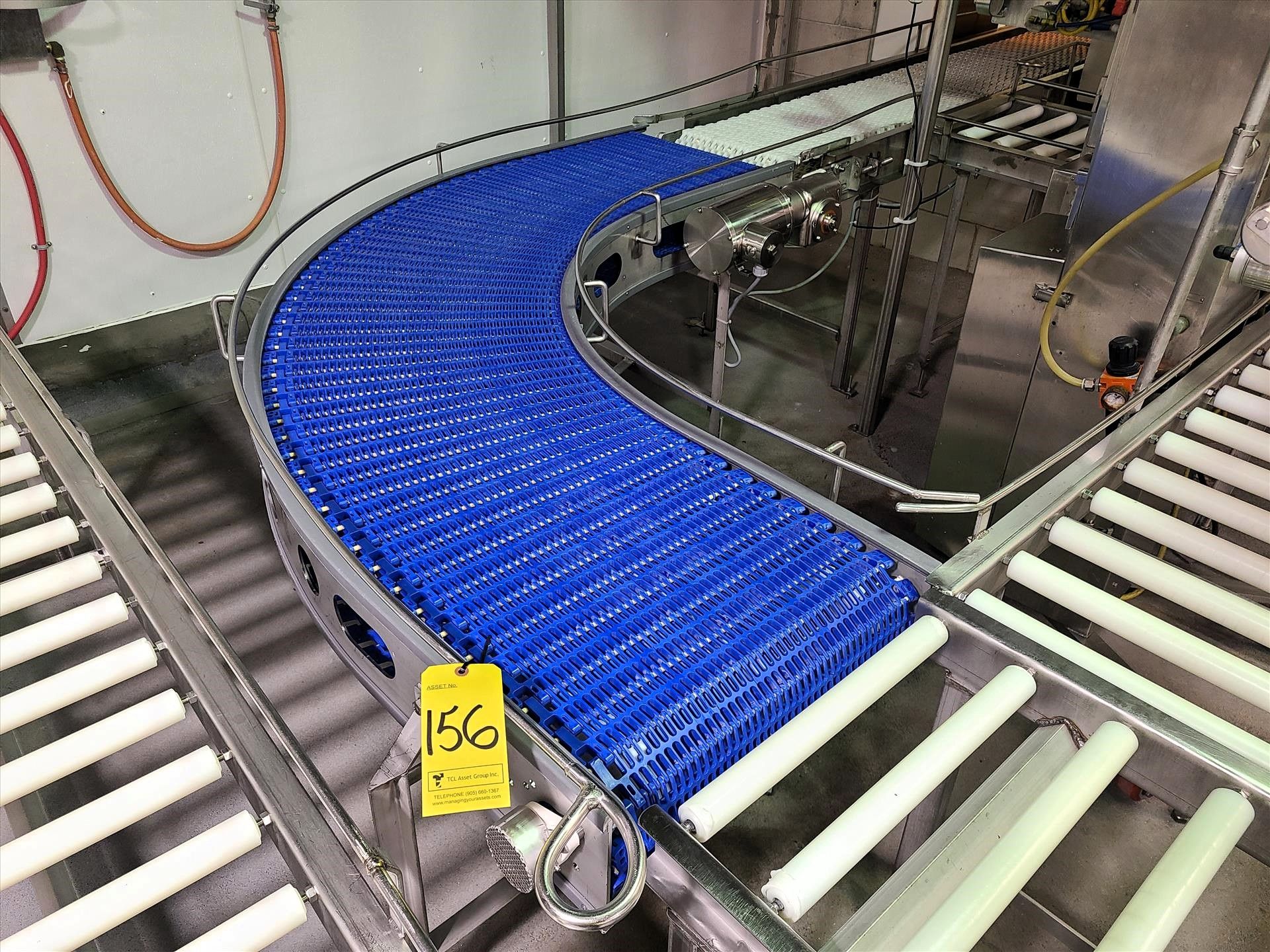 belt conveyor, approx. 22 in. x 8 ft., power, 90 deg., stainless steel, 0.75 hp washdown motor [Loc.