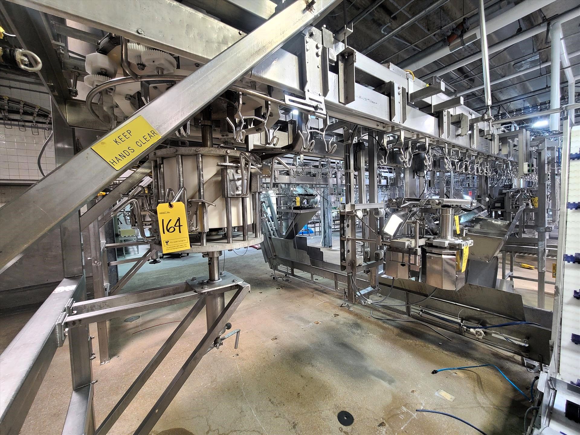 Linco cut-up Line 2, stainless steel, overhead conveyor w/ stainless steel shackles at 12 in.,