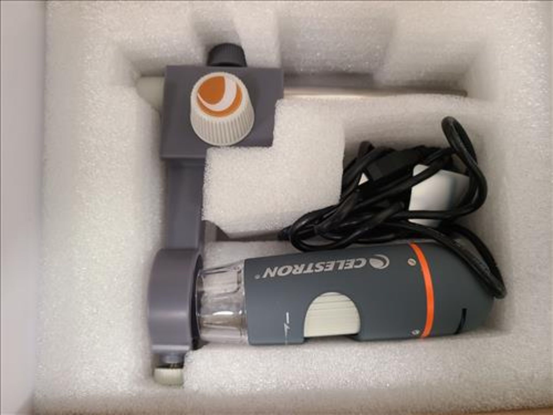 Celestron handheld digital microscope [Loc. Packaging 1, Lab] - Image 2 of 3