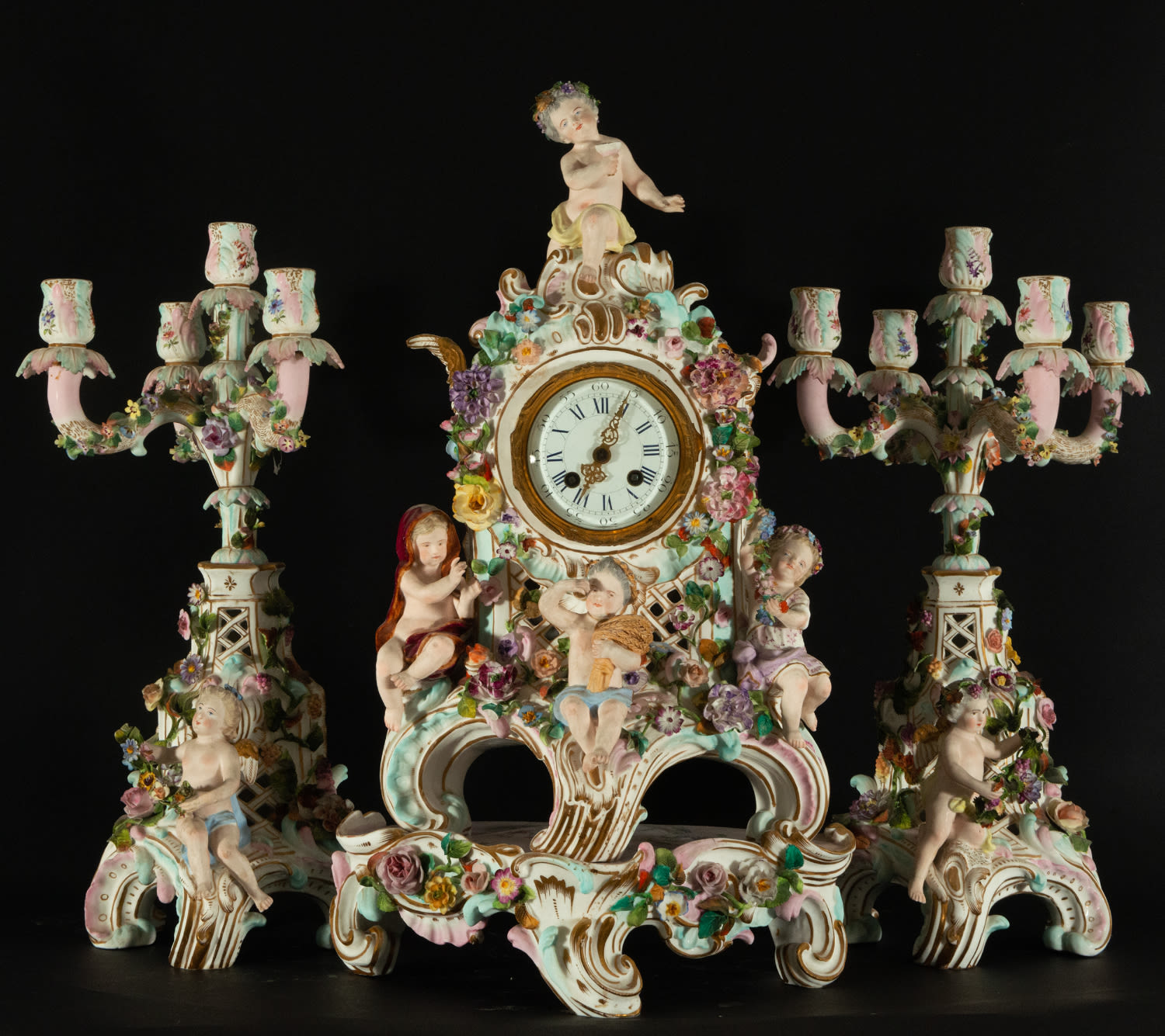 Clock trim and Candelabra in Meissen porcelain with Cherub motifs, 19th century